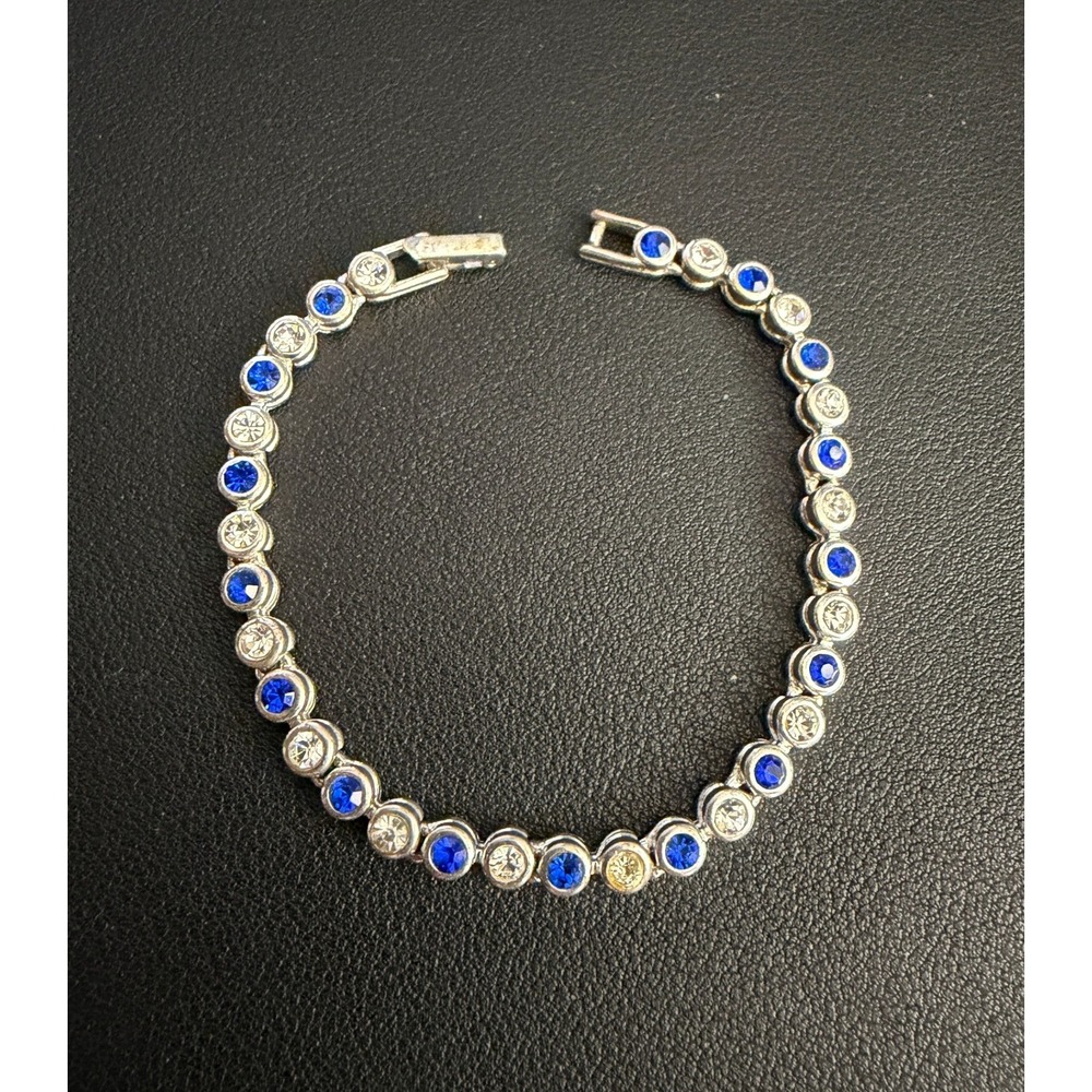 AVON Rhinestone Tennis Bracelet Bezel Set Silver Tone Blue